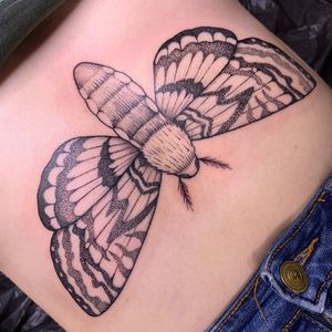Experience the allure of dotwork and fine line realism with this illustrated moth design by talented artist Chris Harvey.