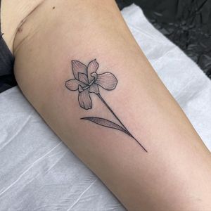 Beautiful illustrative flower design by Chris Harvey on the upper arm