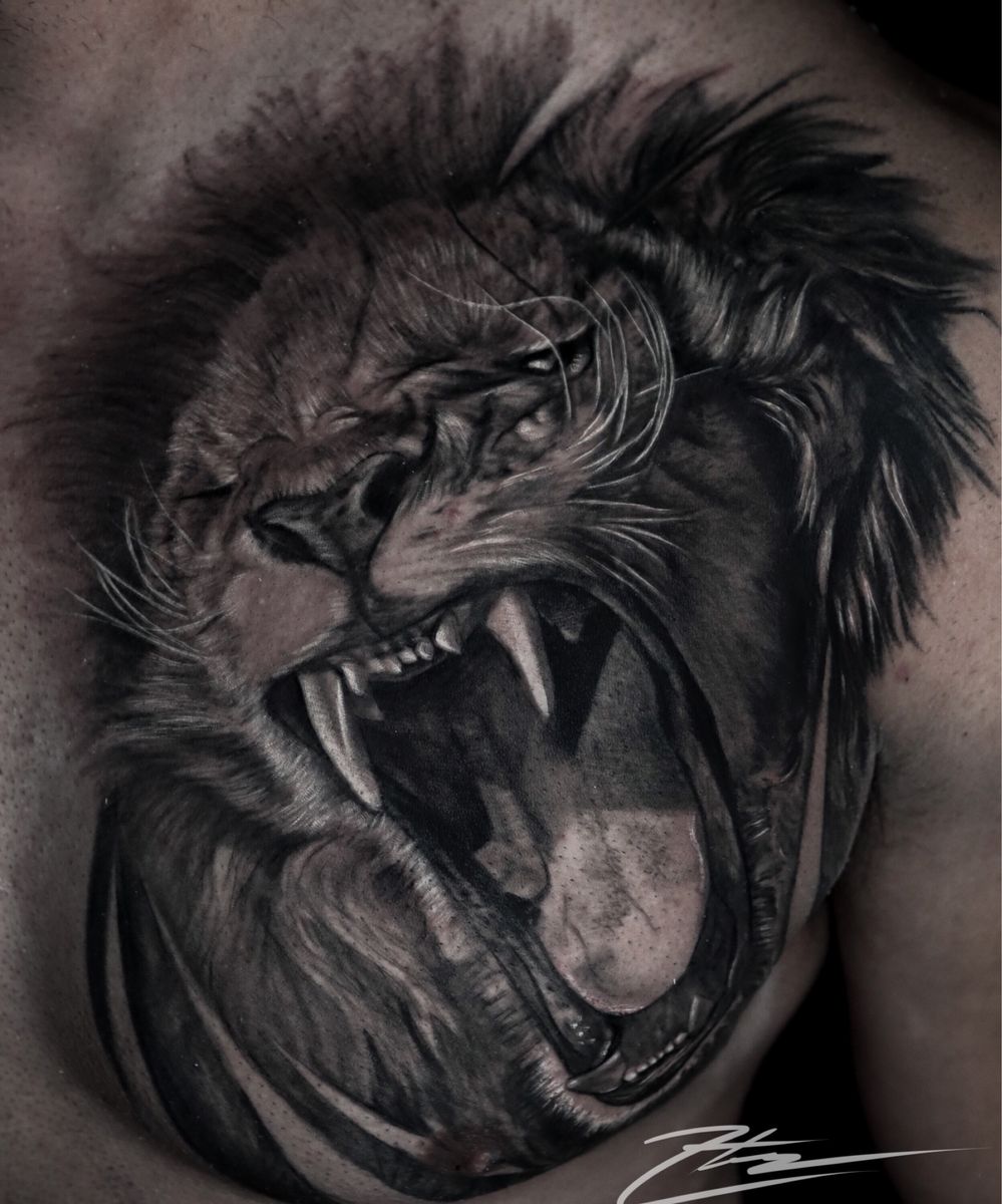 lion head tattoo chest