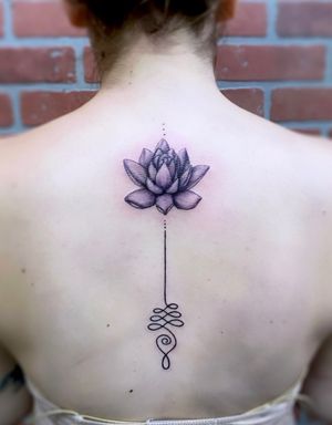 Unalome & lotus with a hint of purple for Racheal.⁣⁣Email to book: kellyann@westlasupply.com ⁣⁣#lineart #unalome #lotusflower #lotus #laandmiami #miami #southbeachmiami #explore #explorepage #simpletattoos #spinetattoo #daintyart #ink #inked #laink #tattoos #smalltattoos #tattooideas #axysvalhalla #axysrotaryartist #hextat #slatecartridges #worldfamousink @empireinkstudios