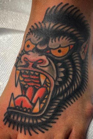 #gorilla on foot. Done at Greenhouse in Asheville, NC,USA.  Email info@greenhouseavl.com for appointments. #traditionaltattoo #tattoo #gorillatattoo