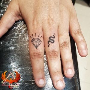 #fingertattoos #diamond #snake #middlefinger #tattoo #tattooforgirls #tattooedgirls #tattoodesign #finger #ladyfinger #girlstattoo #inkedgirls #tattooartist #tattooworld #besttattooartistchandigarh #tattooideas #fingertatts #beautifultattoo #tinytattoo #smalltattoo #hygienetattoo #toptattoo #artist #rikkphoenixtattoo #phoenixtattoo #best #cleanlines #blackandgreytattoo #blacktattoo #homeservice