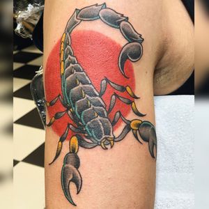 Get a bold new-school or traditional scorpion tattoo on your upper arm in London. Stand out with this fierce design!