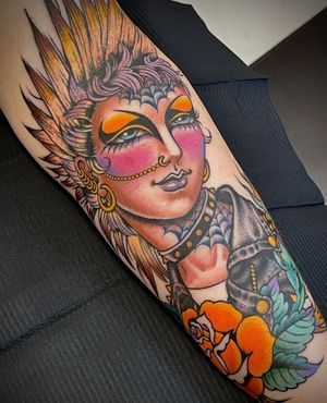 Get a stunning neo-traditional woman tattoo on your arm in the vibrant city of London, GB. Embrace timeless elegance with this unique design.