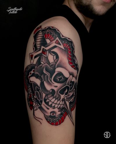 • Skull, Snake and Dagger • custom traditional upper arm piece by our resident @dr.ivo_tattoo for @ryan_powell_yay 💀 Books/info in our Bio: @southgatetattoo • • • #skullsnakedagger #skulltattoo #snaketattoo #daggertattoo #traditionaltattoo #northlondontattoo #sg #southgatetattoo #londontattoostudio #customtattoo #london #northlondon #londontattoo #traditionaltattoo #tattoos #customdesigns #londontattooartist #SGtattoo #amazingink #londonink #realism #southgate #darktattoo #enfield #ink #blackwork #oldschooltattoos