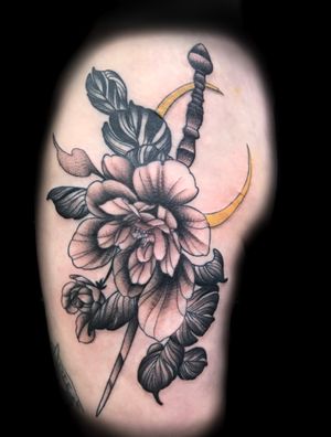 Black and grey neo traditional floral design. (Lines healed)
