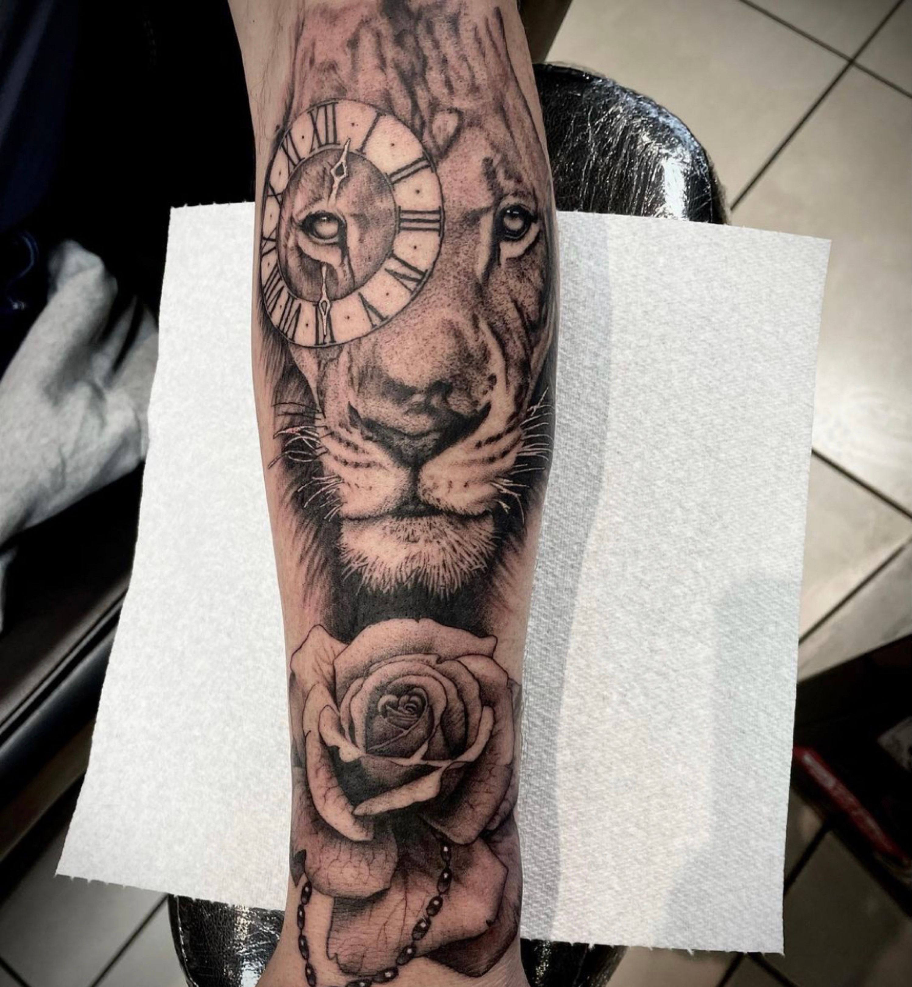 Tattoo uploaded by Alyssa • 🦁💕 #lion #liontattoo #tattoosleeve #sleeve  #romanclock #romanclocktattoo #rose #rosetattoo #rosetattoosleeve  #boldtattoo #detailedtattoo #blackandwhite #largeliontattoo • Tattoodo