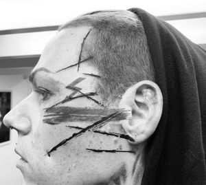 Abstract stripes face tattoo #blackwork #blqckworktattoo #facetattoo #amsterdamtattoo #brushstroketattoo #trashtattoo