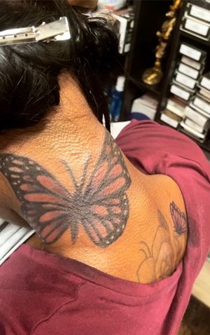 Tattoo by Divine Art Trap Ink