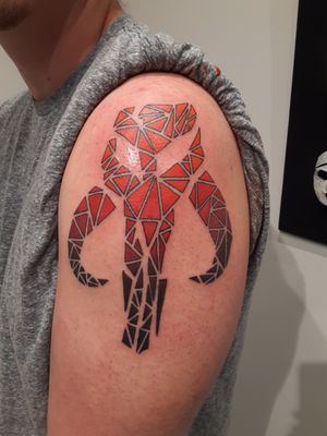 Mythosaur tattoo in a geometric style