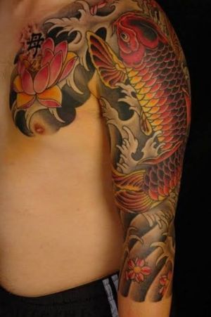 Red and yellow koi fish upper arm 