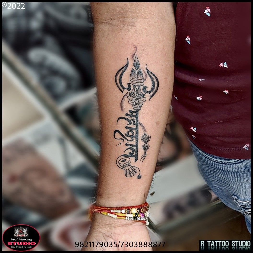 Mahakal tattoo design on hand  mahakal name tattoo with trisul   Tattoo  design for hand Shiva tattoo design Cool tribal tattoos