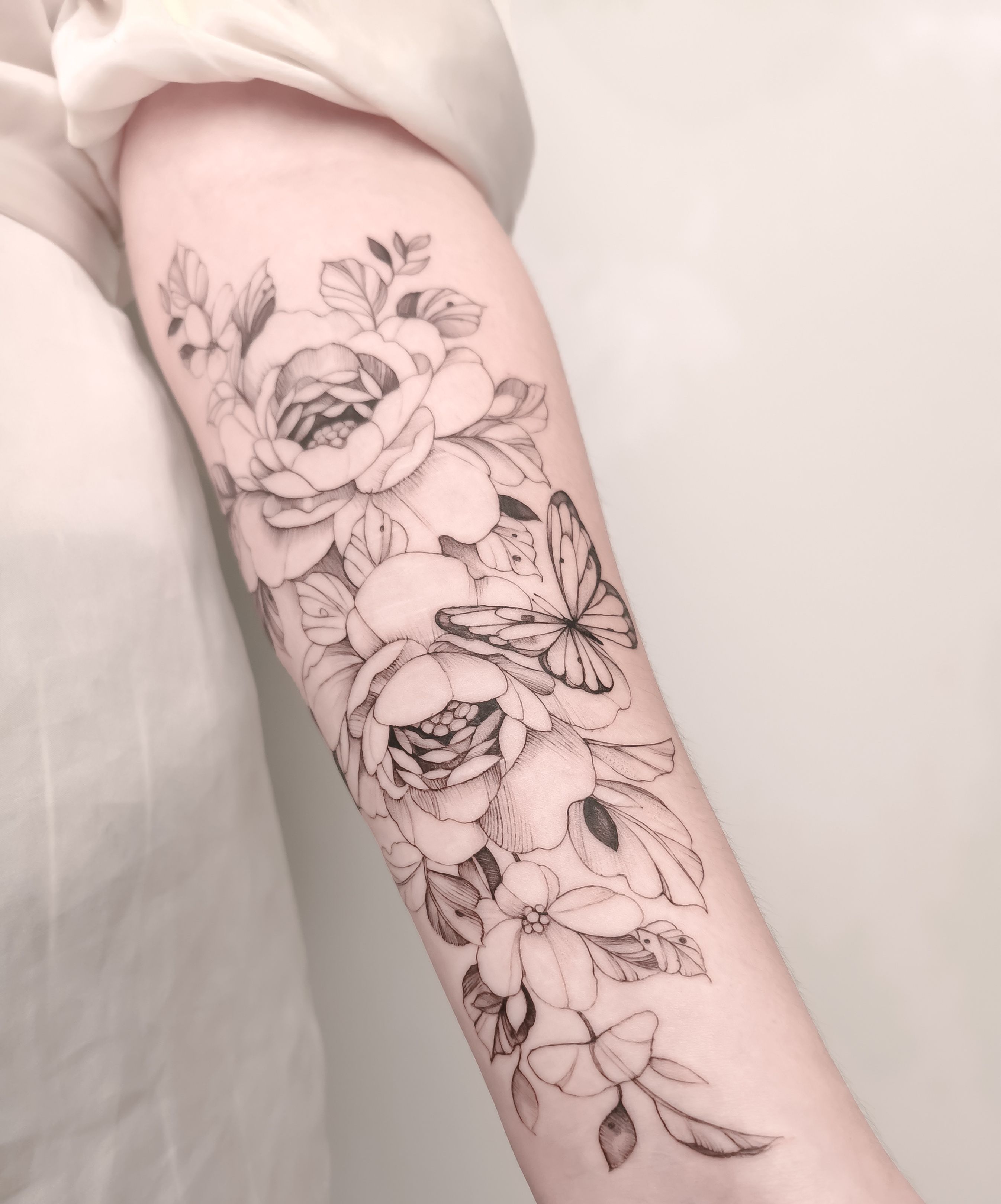 Tattoo uploaded by Wiwi Schrøder • Half sleeve with butterfly 🦋 . . . .  #finelinetattoo #finelinefloraltattoo #floral #floraltattoo  #botanicaltattoo #delicate #ink #backtattoo #sleevetattoo #butterfly •  Tattoodo