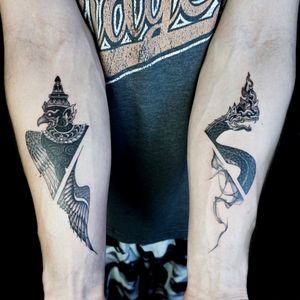 𝙄𝙂: 𝙣𝙖𝙩𝙚_𝙩𝙝𝙖𝙞𝙡𝙖𝙣𝙙 🌿 Blackwork Thai Krut and Naga tattoo by a tattoo artist in Chiang Mai, Thailand 