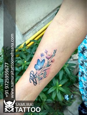 Br logo tattoo |Br tattoo |Flower with butterfly tattoo |Flower tattoo |Tattoo for girls |girls tattoo 