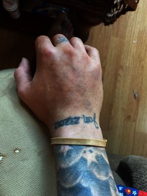 I’d like it to cover my entire right hand and if possible cover the writing on the wrist. 