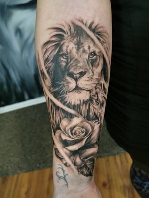 Lion amd rose tattoo