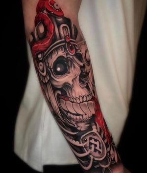 The skull with snake (red)