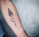 Get a stunning blackwork squid tattoo on your forearm in Los Angeles for a unique and bold look.