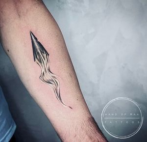 Get a stunning blackwork squid tattoo on your forearm in Los Angeles for a unique and bold look.