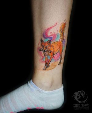 Get a beautifully illustrated watercolor fox tattoo on your ankle in London, GB. Perfect for nature lovers!