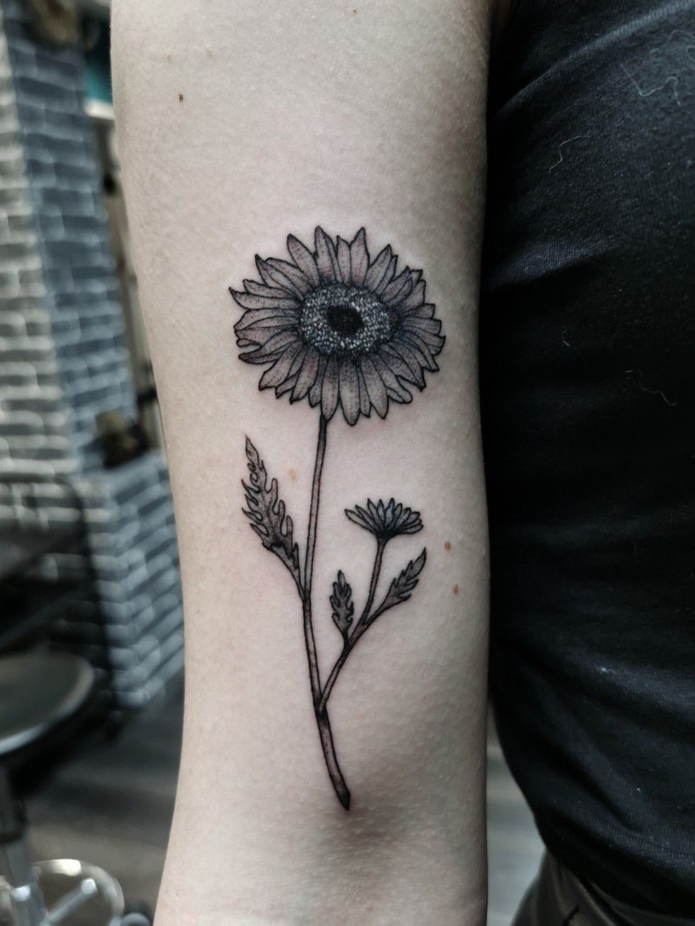 Sunflower by Aka at Black Plague in Norwich, UK (my first tattoo) : r/ tattoos