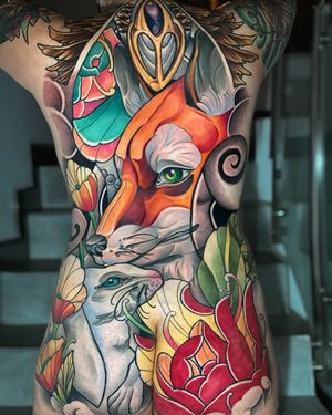 Vibrant neo traditional style tattoo featuring a rabbit, fox, moth, and peony flower. Perfect for a full body suit. Located in Miami, US.