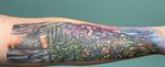 Washington state panoramic  tattoo of all their favorite places from home. 