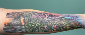 Washington state panoramic tattoo of all their favorite places from home. 