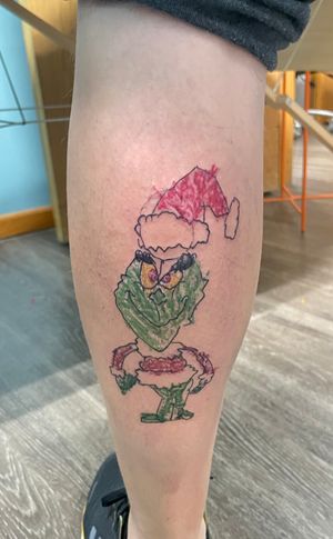 Grinch tattoo based  from my client’s kid’s actual masterpiece 