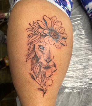 Lion with flower tattoo 
