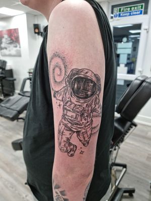 Spaceman on arm