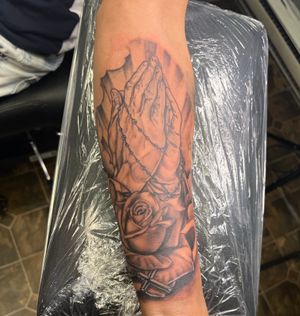 Praying hands  with rose tattoo 