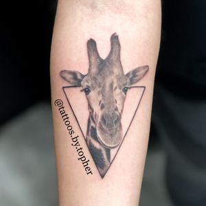 Giraffe tattoo.