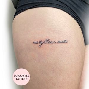 Small and simple text tattoo.