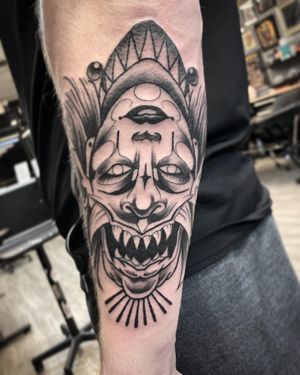 A stunning blackwork tattoo of a hannya woman on the forearm, expertly done by tattoo artist Rico Dionichi.