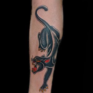 Get inked with an illustrative blackwork panther tattoo by talented artist Chris Tambo. Perfect for bold statement.