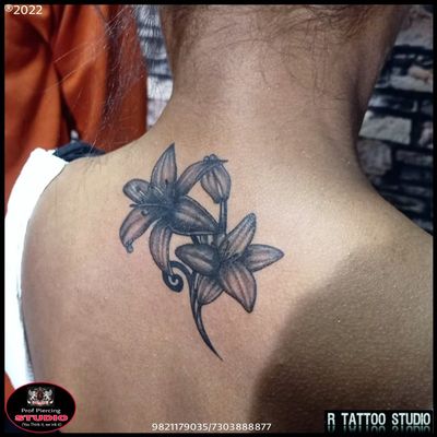 #flowertattoo #flower #tattoo #lilyflower #tattoo #tattooidea #tattooday #tattoostyle #tattoodesign #girlstattoo #flowertattoo #coveruptattoo 