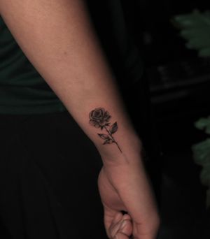a small rose tattoo for our client, fine lines and shadows 