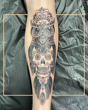 Get an incredible illustrative tattoo of an owl and skull on your shin in London, GB. Unique and detailed design!