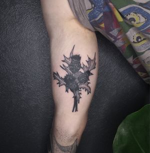 A custom thistle tattoo xoxo