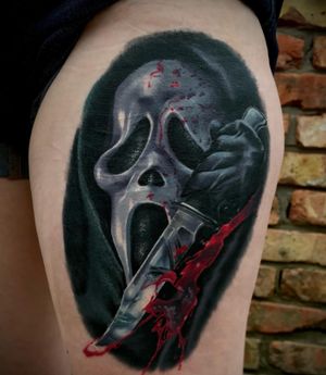 Ghost face from scream. Part of a full leg sleeve in progress. This one is fully healed. Right above the Jason. 