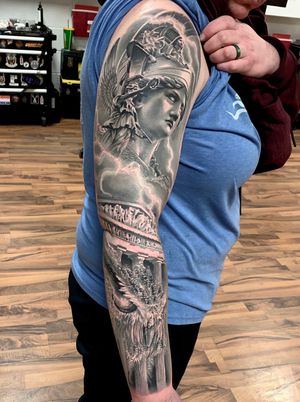 2 days in a row on this one, this was her first tattoo! Athena, the Parthenon, and an owl, which was her bird. The lightening represents her father, Zeus. 