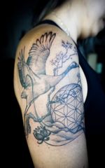 𝙄𝙂: 𝙣𝙖𝙩𝙚_𝙩𝙝𝙖𝙞𝙡𝙖𝙣𝙙 🌿 Blackwork realistic crane bird tattoo with Sakura flowers and fine line flower of life in Chiang Mai, Thailand