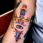 Traditional eye dagger tattoo in color. 