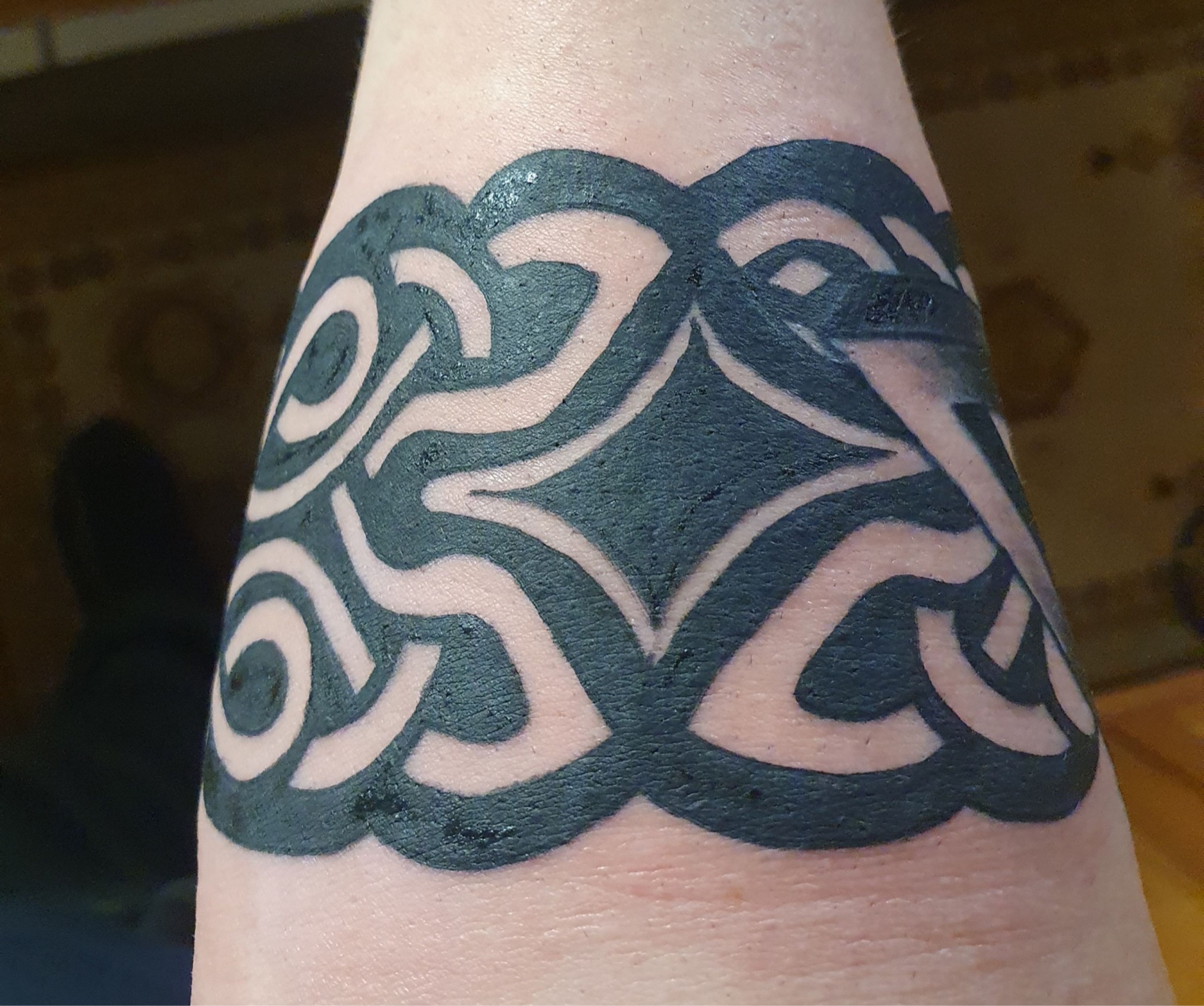 Celtic trinity arm band tattoo