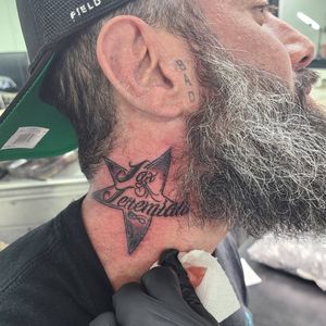Star and names neck tattoo