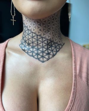 Get a stunning mandala tattoo on your neck done in dotwork style by the talented artist, Lawrence.
