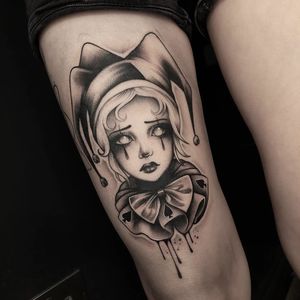 Colorful new school style tattoo featuring a girl and clown in a casino theme, perfect for upper leg placement in London.