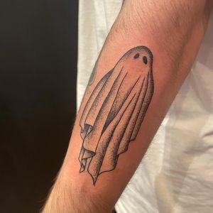 Capture the spirit of London with this haunting fine line ghost tattoo on your forearm.